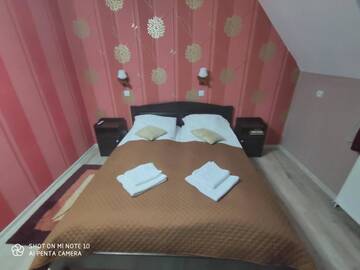 Фото номера Трехместный номер Гостевой дом Siesta Pensiune г. Меркуря-Чук 6