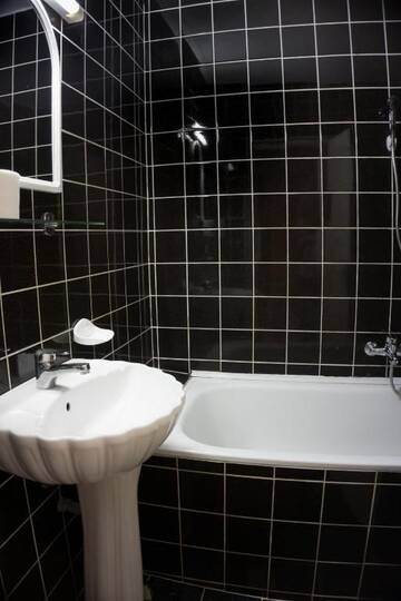 Фото номера Двухместный номер с 1 кроватью Отель Hotel Merkur г. Меркуря-Чук 8