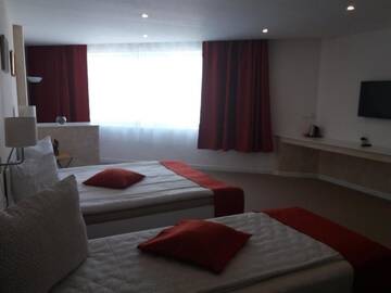 Фото номера Семейный номер Делюкс Отель Csíki Boutique House г. Меркуря-Чук 12