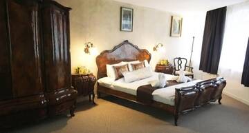Фото номера Номер Делюкс с кроватью размера «king-size» Отель Csíki Boutique House г. Меркуря-Чук 2