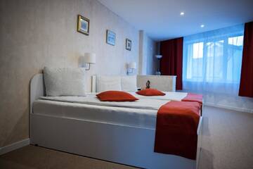 Фото номера Семейный номер Делюкс Отель Csíki Boutique House г. Меркуря-Чук 6